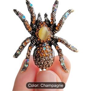 Champagne colored stone center of sparkle spider pin! New